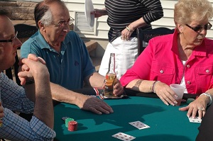 People having fun at a poker table party in New Jersey